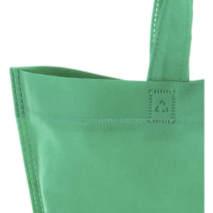 A green reusable grocery bag with stitched handles and a small logo on the side.