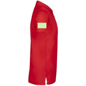A red polo shirt featuring a plain green patch on the sleeve and a classic collared design.