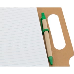 A brown cardboard notepad with lined pages and a green pen secured in a holder.