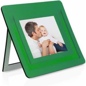 A green photo frame with a stand, displaying a photo of a man with a baby. It features a logo on the base.