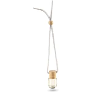 A glass bottle air freshener with a wooden cap, suspended on a white cord. The bottle contains a clear liquid.
