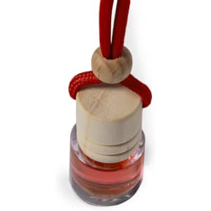 A red and clear glass air freshener with a wooden cap and red cord for hanging.
