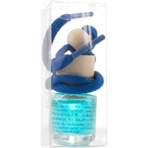 A blue air freshener in a clear package, featuring a wooden figure entwined with a blue cord atop a glass bottle.