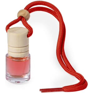A small glass bottle of air freshener with a wooden cap and a red cord for hanging, featuring a pink liquid.