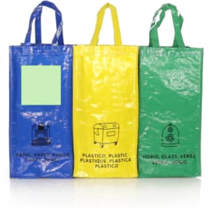 Three reusable bags in blue, yellow, and green, featuring handles and icons for recycling materials. Each has a logo.
