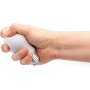A white stress ball shaped like a light bulb, being squeezed by a hand.