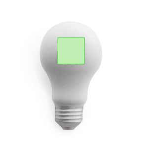 A green and white stress ball shaped like a light bulb, featuring a square design on its surface.