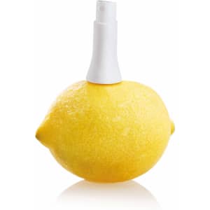 A yellow lemon with a white spray nozzle attached, resembling a vaporizer for home use.