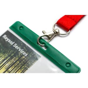 A green name badge holder with a clear insert and a red lanyard, featuring a clip for attachment.