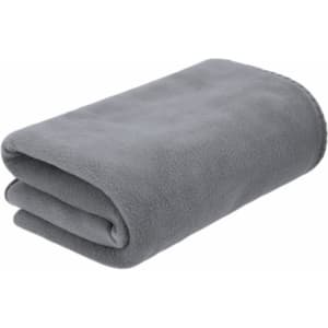 A folded grey blanket made from soft material, featuring clean edges and a smooth texture. It has a branding logo on it.