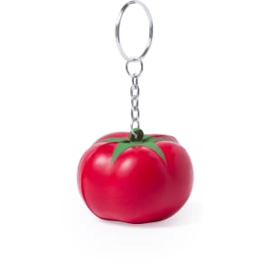 A red tomato-shaped keyring with a green leaf design attached to a metal keychain.