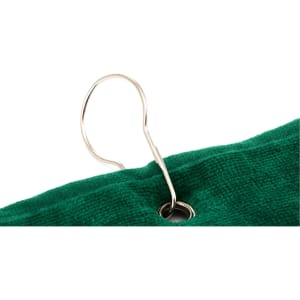 A green golf towel featuring a metal hook for easy attachment.