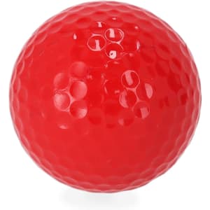 A red golf ball with a textured surface featuring a logo.