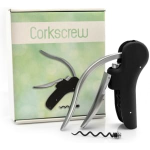 A corkscrew in black and silver, displayed with its packaging featuring a pastel green background and a logo.