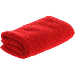 A folded red absorbent towel with a textured surface, designed for leisure and outdoor activities.