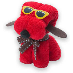 A red plush toy dog wearing yellow sunglasses and a brown bow tie, with brown fabric ears. It has a friendly expression.