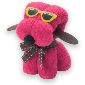 A pink plush dog toy with sunglasses and floppy ears, wearing a brown checkered bow tie.