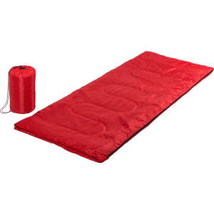 A red sleeping bag laid out flat next to a matching red storage bag. The sleeping bag features a quilted design.