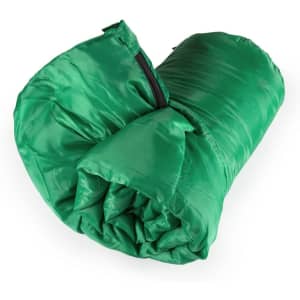 A green sleeping bag, tightly rolled and featuring a zip, with a smooth, shiny texture. It has branding visible on the surface.