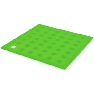 A green silicone place mat featuring a dotted pattern, ideal for home dining or decorative purposes.