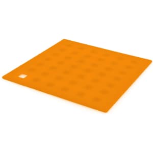 An orange silicone placemat featuring a textured design with small circular patterns and a corner cutout.