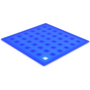 A blue placemat with a textured grid pattern and a small logo in one corner.