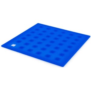 A blue silicone place mat with a textured surface and a small branding logo.