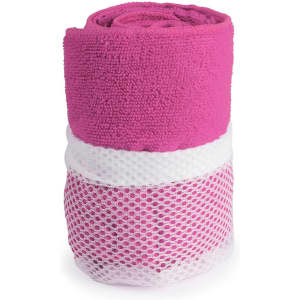 A pink gym towel rolled and stored in a white mesh bag, featuring a textured surface.