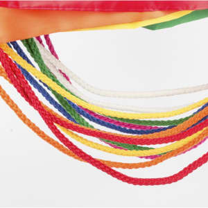 A collection of vibrant drawstring cords in various colours, attached to a multi-coloured bag design.