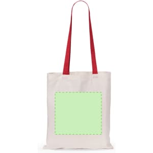A tote bag in cream colour with red handles and a blank green square for custom designs.