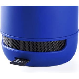 A blue Braiss Speaker featuring a textured mesh grille and a slot for a memory card.