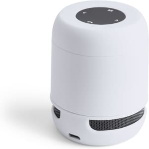A white portable speaker with a round shape and control buttons on top, featuring a mesh speaker grille at the bottom.