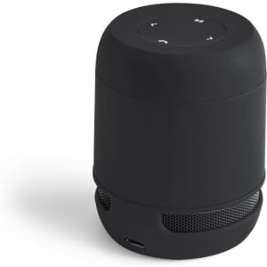 A portable black speaker with a round design and control buttons on top. It features a vented base for sound output.