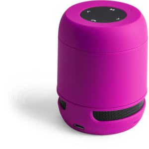 A pink portable speaker with a rounded design, featuring control buttons on the top and a mesh base.