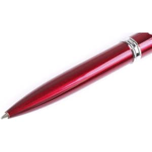 A red metal pen with a shiny finish and silver accents, featuring a logo.