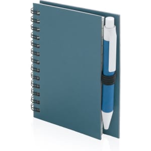 A blue spiral-bound notebook with a matching pen secured in the cover. It has a simple design and no visible branding.