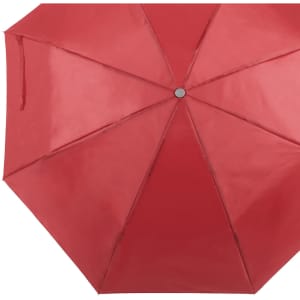 A red umbrella features a sleek, smooth surface with eight panels and a central fastening. It has a logo on the handle.