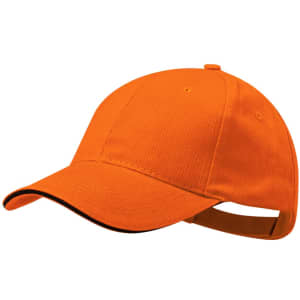 An orange cap with a curved peak and a contrasting black trim, featuring a logo on the front.
