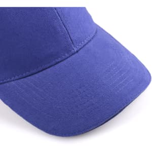 A purple cap featuring a curved brim and a subtly textured fabric. It includes a logo on the side.