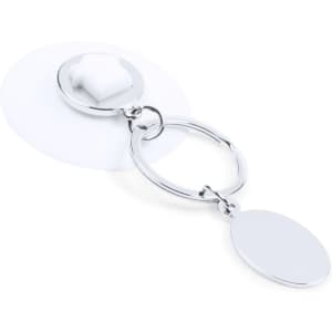 A silver keyring coin with a circular design and a smooth decorative piece attached. It has a logo on one side.