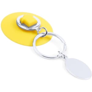 A yellow keyring with a round base and a silver ring, featuring a small, raised button on top.