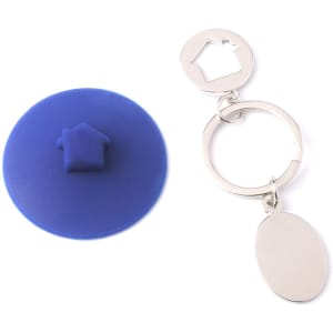 A blue silicone coin with a house design attached to a silver keyring. The keyring includes a blank oval tag.