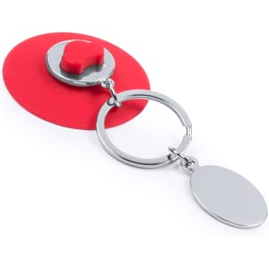 A keyring with a silver metal ring, featuring a red silicone topper and a smooth circular pendant.