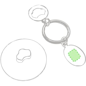 A silver keyring with a circular coin and a small oval attachment, featuring a logo and a green highlight.