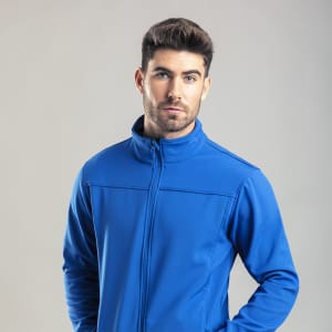 A blue soft shell jacket displayed on a model with a neutral background. The jacket has a logo on it.