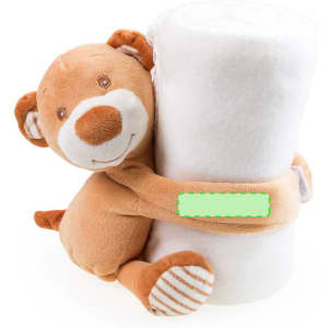 A fluffy white blanket with a plush teddy bear hugging it, featuring brown and cream details.