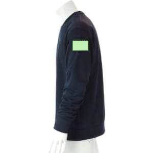 A navy technical sweatshirt with a green patch on the left sleeve displayed on a mannequin.