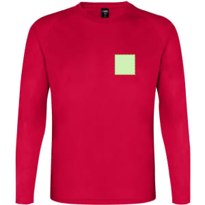 A red long-sleeved T-shirt featuring a square patch. The shirt has a logo on the tag.