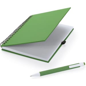 A green spiral-bound notebook with blank pages alongside a matching green pen.