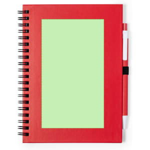 A red spiral notebook featuring a blank green area, accompanied by a red pen. It has a logo on the cover.